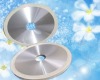 Vitrified diamond bruting wheel for natural diamond